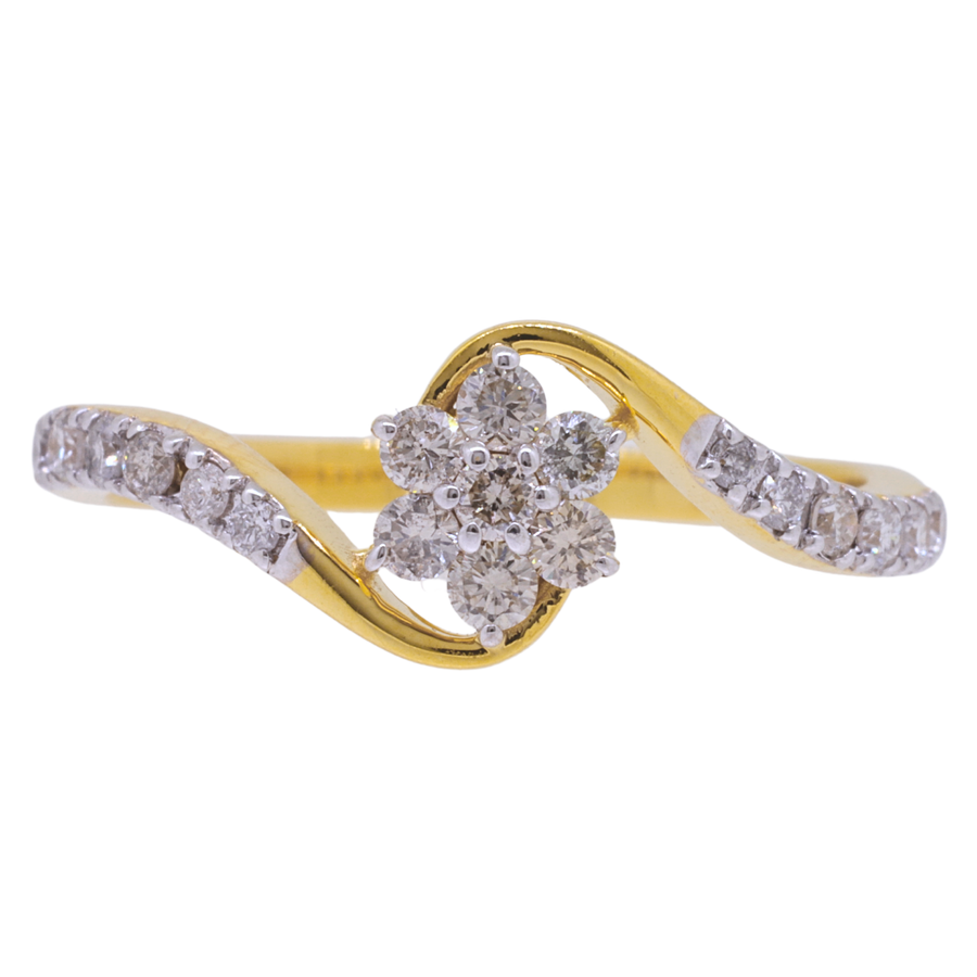 Gold ring with diamond flower design